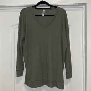 Local boutique, olive green waffle sweater. Very cozy.